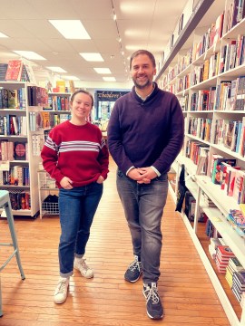 bookstore bookseller posing